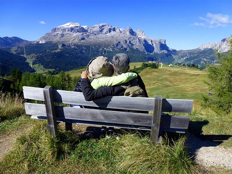 Couple on bench Dolomites Walking Tours