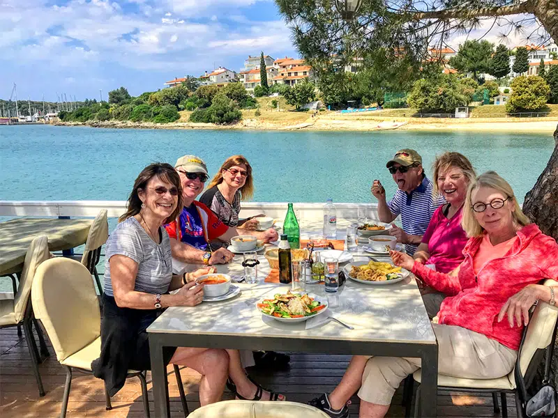 group of trekker enjoying food in slovenia europe